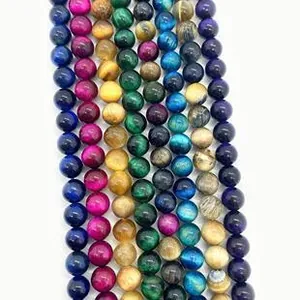 Vertical rows of multicolored 4-12mm round malachite and gemstone beads for DIY crafts