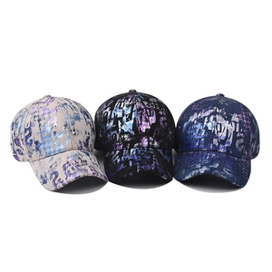 Set of tie-dye graffiti baseball caps in beige, black and navy with blue metallic prints