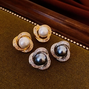 Vintage swirl flower pearl stud earrings with zircon inlay in gold and silver finish