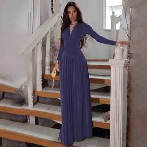 Close-up of elegant deep purple long sleeve V-neck maxi dress with slim waist design
