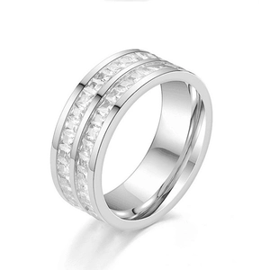 Close-up of double-row pavé set cubic zirconia on a silver titanium steel ring band