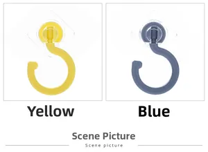 Detail view of rotating S-shaped ceiling hooks in yellow and blue with adhesive base
