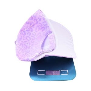 Fashionable purple leopard print kids baseball cap on scale weighing 66 grams