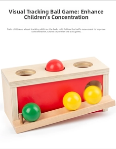 Detail of wooden visual tracking toy with colorful solid balls and gravity slide