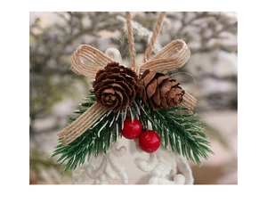 Close-up of Christmas pine cone pendant with red berries and jute bow decoration