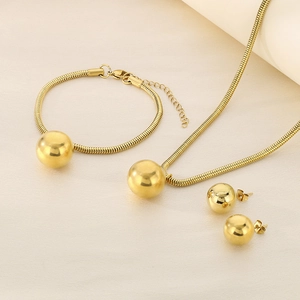 Detailed close-up of 18K gold-plated snake chain jewelry set with spherical pendants
