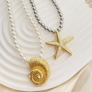 Gold starfish and conch pearl necklaces set for beach vacation resort style jewelry