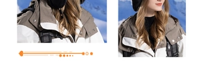 Detail der Colorblock-Skijacke mit Stehkragen und funktioneller winddichter Kapuze im Schnee