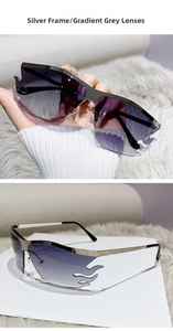 Detail of Y2K flame-shaped rimless sunglasses with gradient grey lenses and silver frame