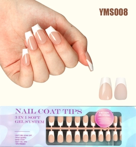Close-up of 3-in-1 soft gel system French nails with nude base and white tips packaging