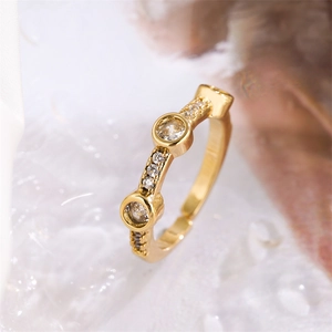 Detailed view of a gold eternity ring featuring sparkling pavé set cubic zirconia