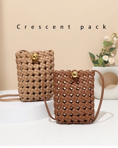 Close-up of khaki and dark brown woven leather crossbody phone bags with golden spherical clasps