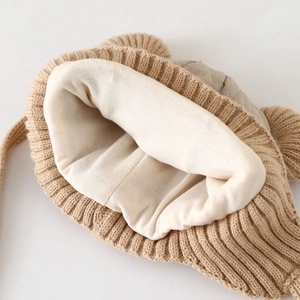 Winter knit bear ear hat for kids featuring thick warm fleece lining and ear flaps