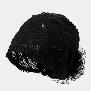 Detailed view of the rose pattern on this breathable black lace pullover beanie hat
