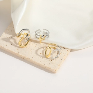 Minimalist two-tone swan and star adjustable open rings set on white stone and satin