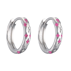 Detailed view of silver hoop earrings featuring pink enamel and carved star patterns