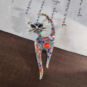 Elegant cat brooch in silver finish with vibrant multicolored rhinestones for women