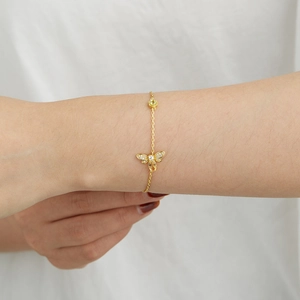Luxurious S925 sterling silver bee bracelet with sparkling zircon stones on model wrist