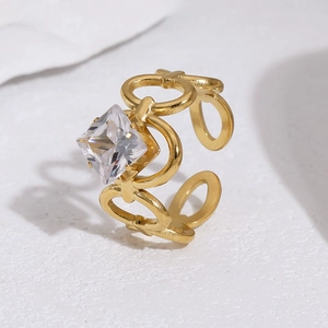 Detailed macro view of 18k gold plated chain link ring featuring a square white zircon stone