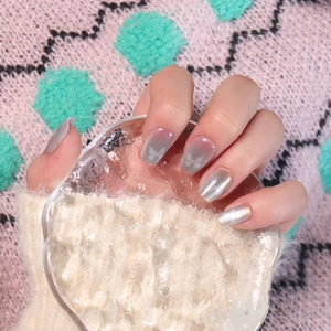 Press-on nails featuring butterfly patterns and silver cat-eye metallic finish
