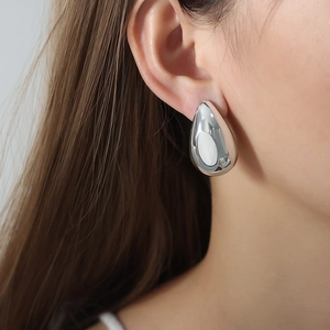 Polished silver teardrop earrings in minimalist water drop design for stylish women