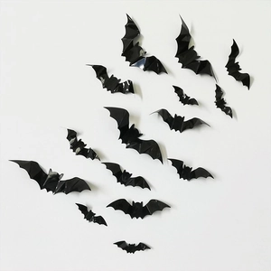 Detail of 14-piece 3D black PVC bat wall stickers in various sizes for Halloween decor