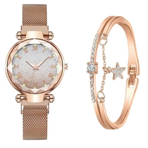 Detail of rose gold mesh watch with starry dial paired with a matching star charm bracelet