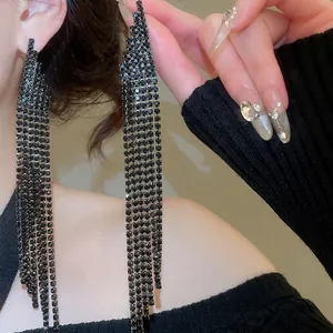 Elegant long black fringe earrings with sparkling rhinestones for a sophisticated style