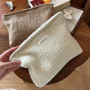 Minimalist wool tweed cosmetic bags in beige and coffee with simple wish woven label