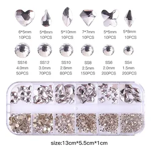 12-grid box of glass nail art rhinestones with mixed heart, drop, and round shapes