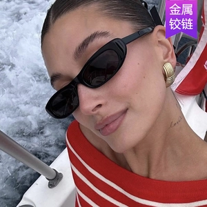 Fashionable black oval cat eye sunglasses for women with durable metal hinges