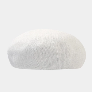 Detailed view of the soft white angora wool texture on this knitted beret hat