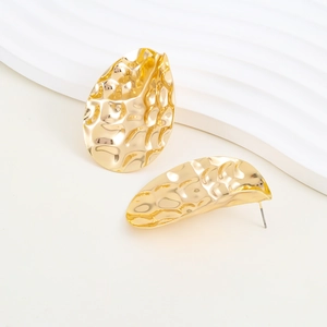 Fashionable gold irregular hammered teardrop metal earrings for women in minimalist style