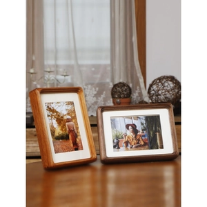 Classic mortise and tenon solid wood photo frames in walnut with rounded corners