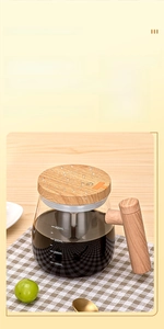 Detail of waterproof 400ml self-stirring coffee mug with wood grain handle and scale