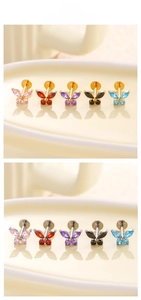 Detailed view of titanium butterfly labret studs with colorful marquise zircons