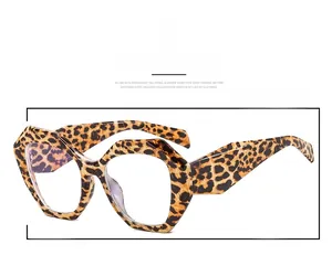 Close-up of geometric leopard print eyeglass frames with trendy polygonal design