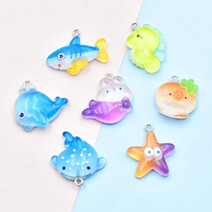 Cartoon resin ocean animal charms featuring shark, seahorse and starfish with metal rings