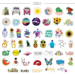 Flat lay of multiple VSCO style waterproof PVC stickers with animals and nature motifs