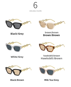 Six colors of cat eye sunglasses with metal chain temples on white background