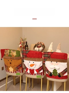Three-piece Christmas chair covers with elk, snowman and Santa in festive red plaid