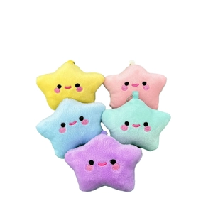 Five colorful plush star charms with embroidered smiling faces and hanging metal chains