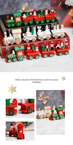 Macro detail of hand-painted wooden Christmas train figurines with Santa and Snowmen