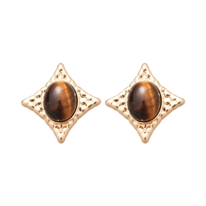 Vintage gold hammered starburst stud earrings featuring oval tiger's eye stones