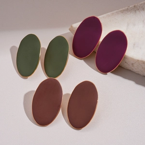 Matte oval stud earrings in olive green, burgundy, and brown with gold metallic edges