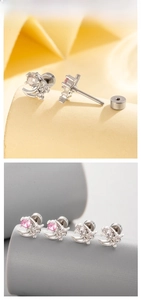 Detail of moon and star helix earrings with pink and clear cubic zirconia and screw back