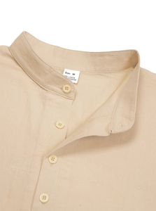 Detail view of the stand-up collar and high-quality linen fabric texture of the men's shirt