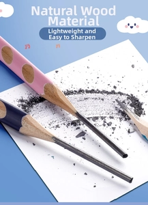 Macro detail of natural wood pencil tip with pink and blue dot patterns and sharp lead
