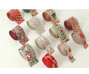 Detail of Christmas faux linen ribbons showing reindeer, trees and fiber texture