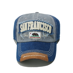 Close-up of vintage patchwork baseball cap with San Francisco embroidery and bear logo